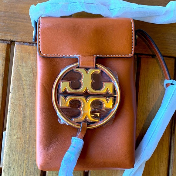 Tory Burch Handbags - Tory Burch Purse brand new with tags and still covered. Beautiful leather!